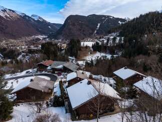 Nestled in a picturesque mountain setting, this charming property offers a serene escape.