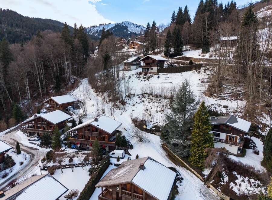 Discover the charm of mountain living in this stunning chalet nestled in a picturesque winter wonderland.