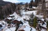 Discover the charm of mountain living in this stunning chalet nestled in a picturesque winter wonderland.