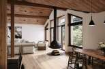 Experience luxury living in this stunning property, featuring a modern design with a cozy fireplace.