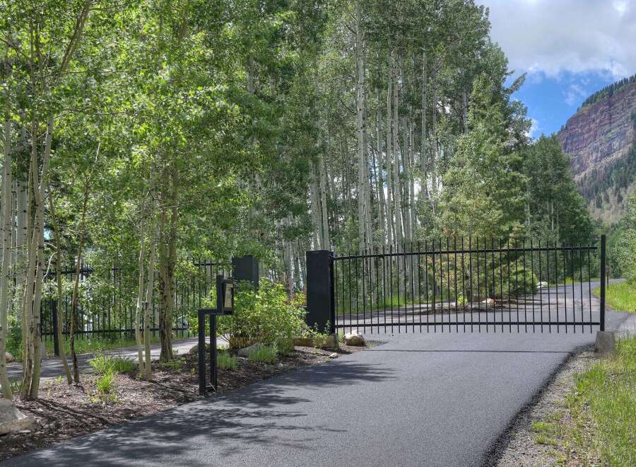 Discover the epitome of privacy and luxury with this gated property.