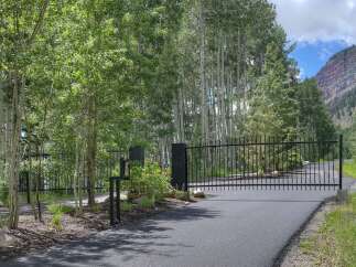 Discover the epitome of privacy and luxury with this gated property.