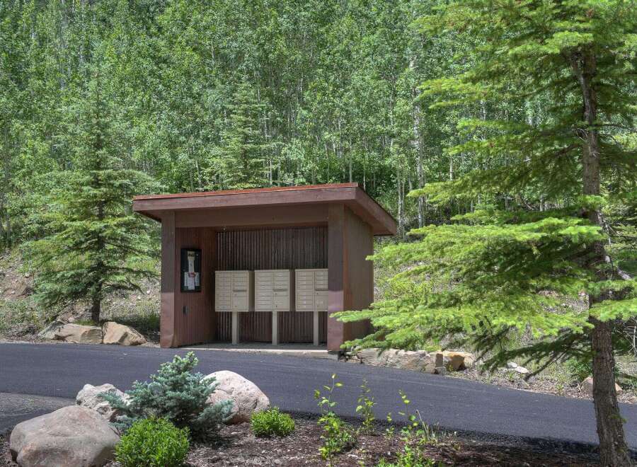 Nestled in a serene natural setting, this property offers a unique blend of convenience and tranquility.
