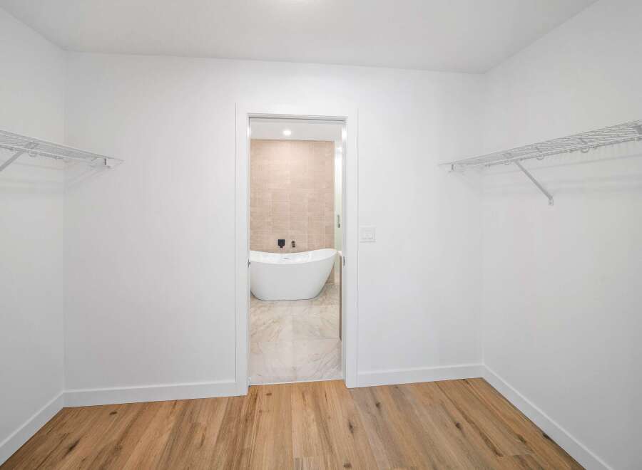 Step into luxury with this stunning bathroom featuring a modern design and elegant finishes.