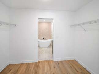 Step into luxury with this stunning bathroom featuring a modern design and elegant finishes.