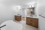 Step into luxury with this stunning bathroom featuring a modern design.