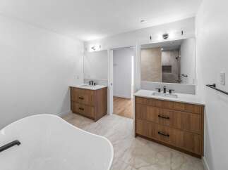Step into luxury with this stunning bathroom featuring a modern design.