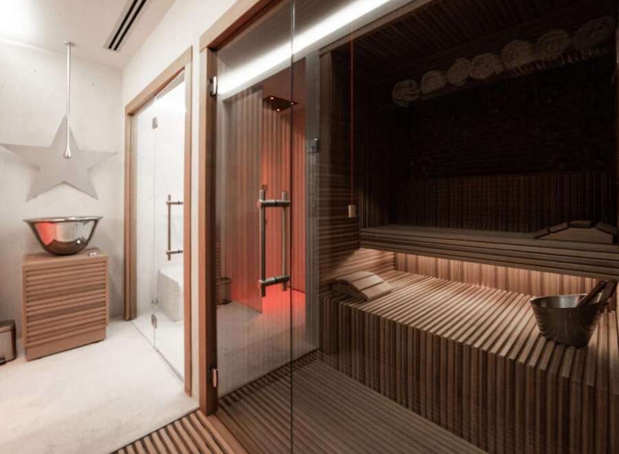 Step into luxury with this stunning spa-like sauna.