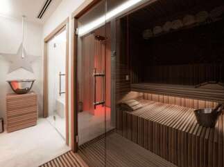 Step into luxury with this stunning spa-like sauna.