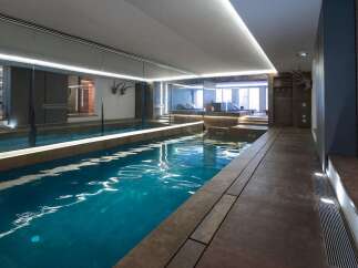 Experience luxury living with this stunning indoor pool.