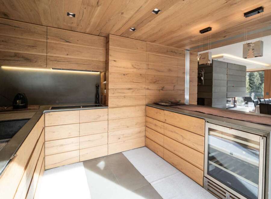 This stunning kitchen boasts a modern design with a warm, inviting feel.