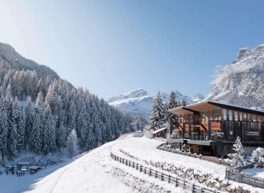 Nestled in a picturesque winter wonderland, this stunning property offers a unique blend of modern design and natural beauty.