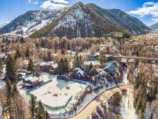 Nestled in a picturesque mountain setting, this property offers stunning views and a serene atmosphere.