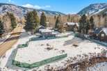 Discover a stunning property nestled in a picturesque mountain setting.