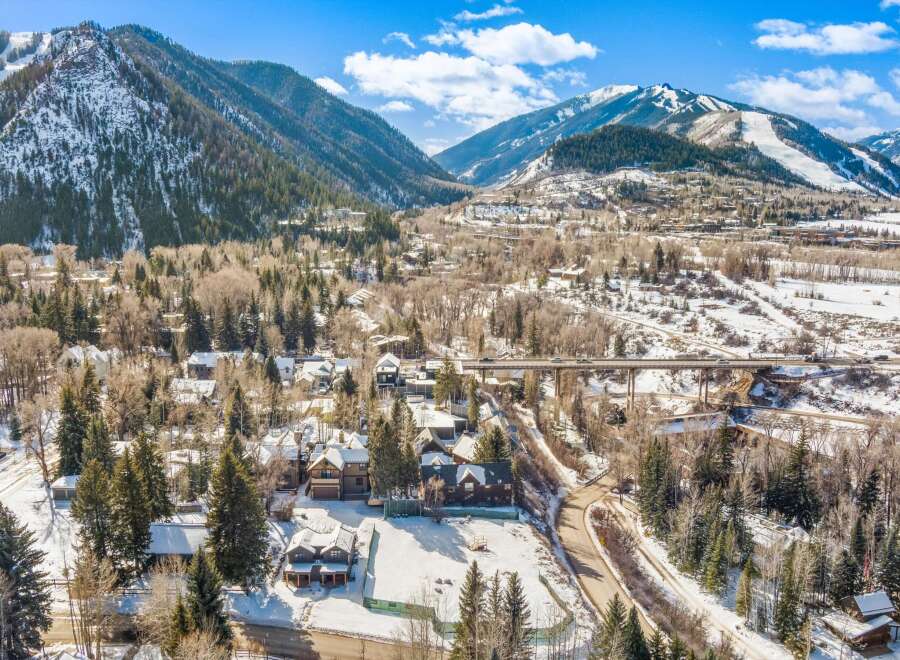 Nestled in a picturesque mountain landscape, this stunning property offers a serene retreat.