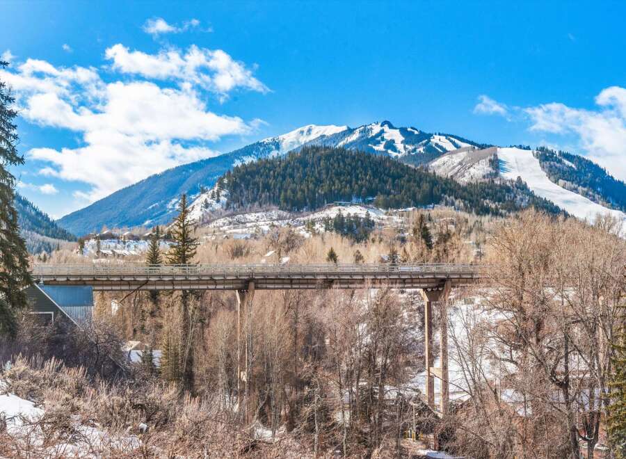 Nestled amidst the majestic mountains, this property offers stunning views and a serene atmosphere.