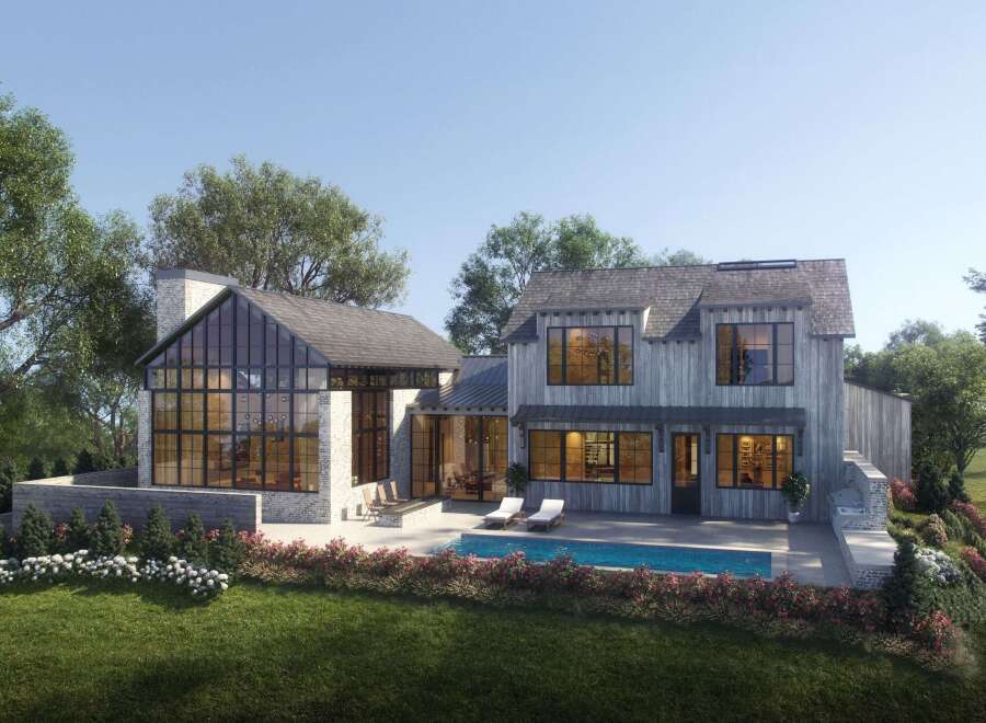 This stunning modern farmhouse boasts a beautiful exterior with a pool, perfect for outdoor entertaining.