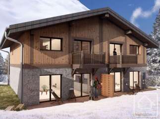 Discover the charm of this stunning alpine property, featuring a beautiful wooden facade and stone base.