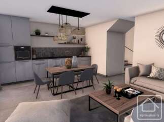 This modern living space features a stylish kitchen with sleek cabinetry and a dining area perfect for entertaining.