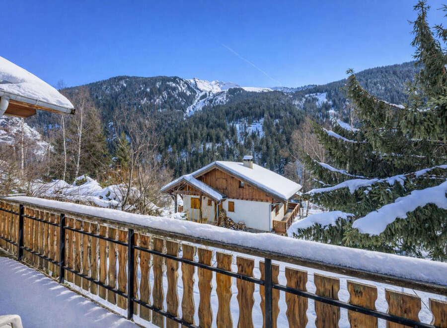 Escape to the serene beauty of this charming chalet nestled in the heart of the mountains.