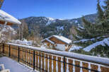 Escape to the serene beauty of this charming chalet nestled in the heart of the mountains.