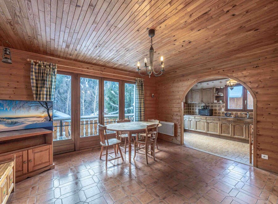 Step into this charming chalet and be captivated by its rustic elegance.
