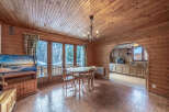 Step into this charming chalet and be captivated by its rustic elegance.
