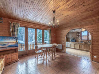 Step into this charming chalet and be captivated by its rustic elegance.