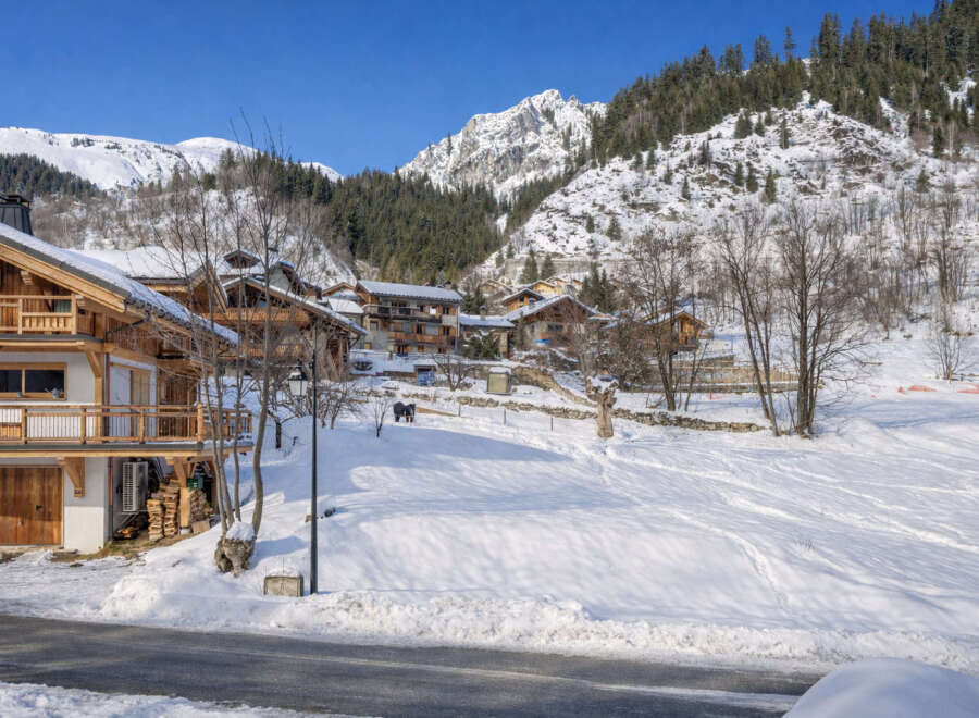 Discover the charm of this stunning mountain chalet nestled in a picturesque winter wonderland.