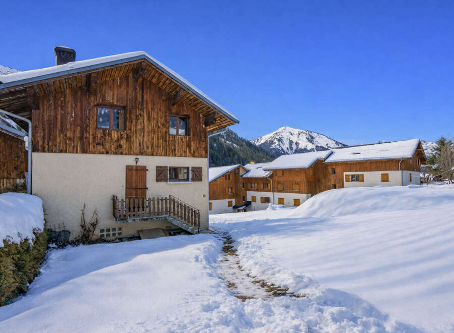 Discover the charm of this stunning chalet nestled in a winter wonderland.