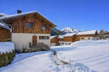 Discover the charm of this stunning chalet nestled in a winter wonderland.