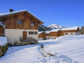 Discover the charm of this stunning chalet nestled in a winter wonderland.