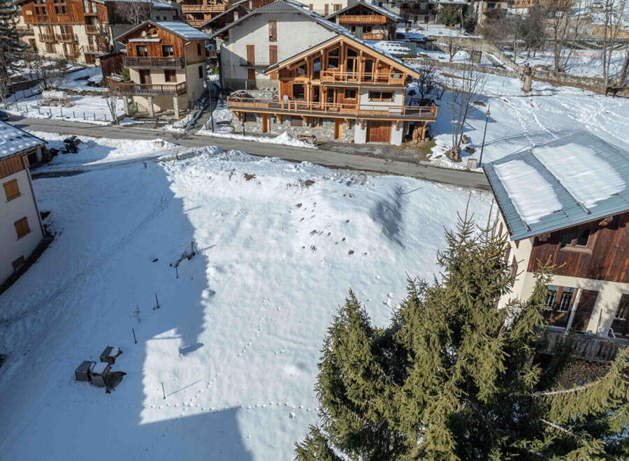 Discover a charming chalet nestled in a picturesque winter wonderland.