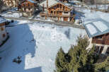Discover a charming chalet nestled in a picturesque winter wonderland.