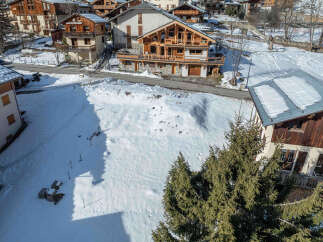 Discover a charming chalet nestled in a picturesque winter wonderland.