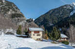 Nestled in a picturesque mountain setting, this charming property offers a serene escape.