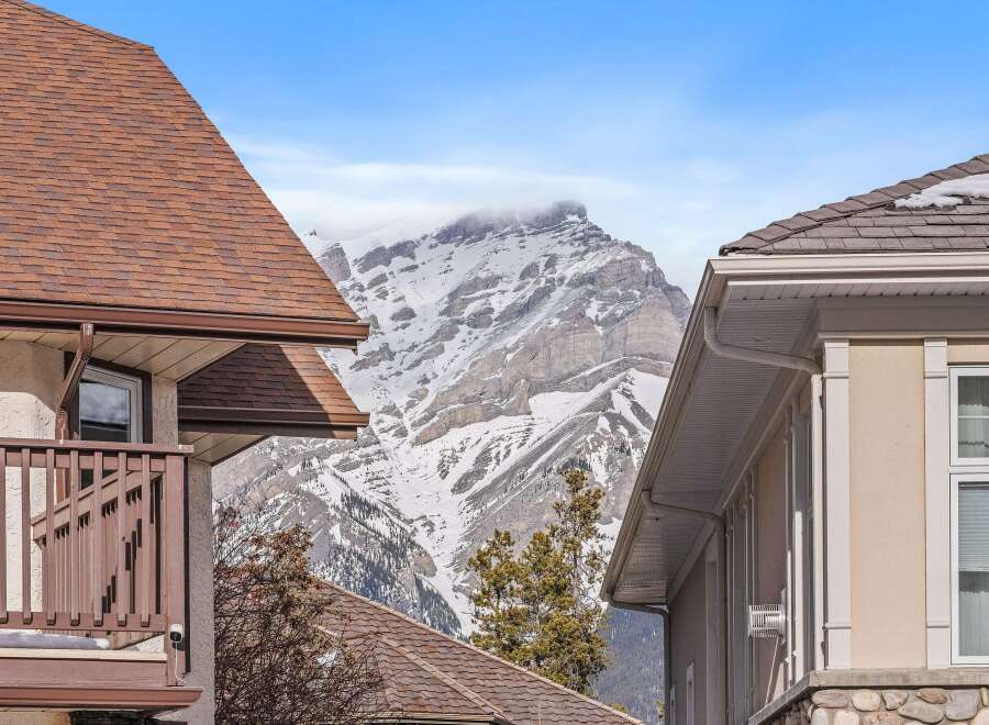 Nestled amidst breathtaking mountain views, this stunning property offers a serene escape.