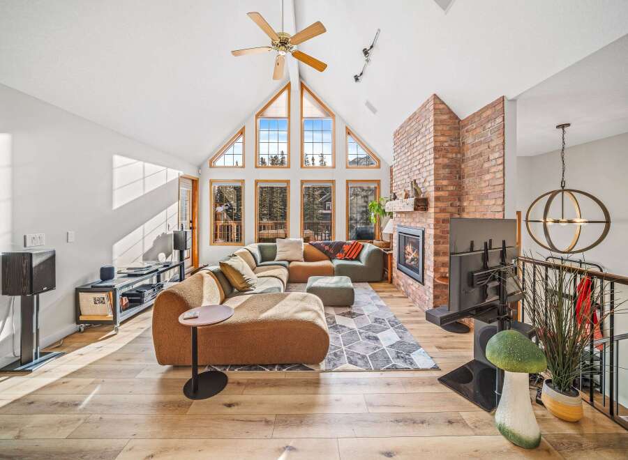 Step into luxury with this stunning property featuring a cozy fireplace, perfect for those chilly evenings.