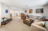 This inviting living space features a comfortable sectional sofa, perfect for relaxing and entertaining.