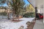 Discover the charm of this property, featuring a serene backyard with a touch of winter's beauty.