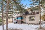 This charming property features a beautiful exterior with a balcony and a cozy atmosphere.