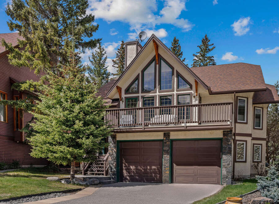 This stunning property boasts a beautiful exterior with a unique architectural design.