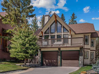 This stunning property boasts a beautiful exterior with a unique architectural design.