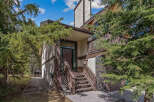 Nestled amidst lush greenery, this charming property offers a serene escape.