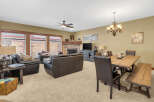 This stunning living space features a cozy fireplace, perfect for those chilly evenings.