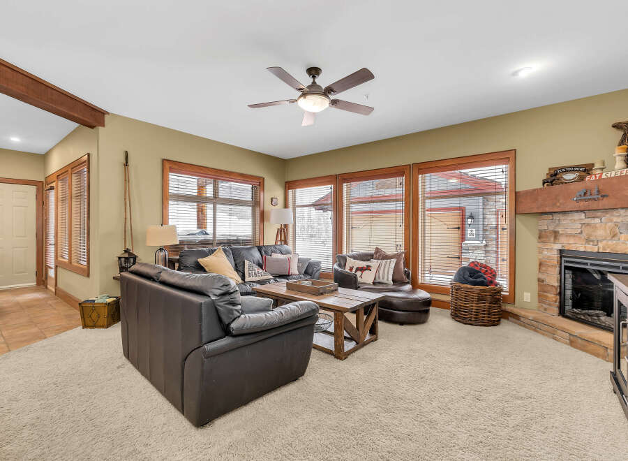 Step into a cozy living space with a rustic charm.