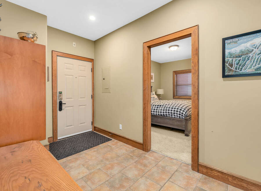 Step into this inviting entryway, showcasing a warm and welcoming atmosphere.