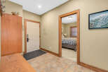 Step into this inviting entryway, showcasing a warm and welcoming atmosphere.