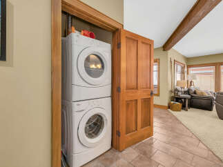 Discover the convenience of in-unit laundry with this stunning property! This home features a modern stacked washer and dryer, making laundry day a breeze.
