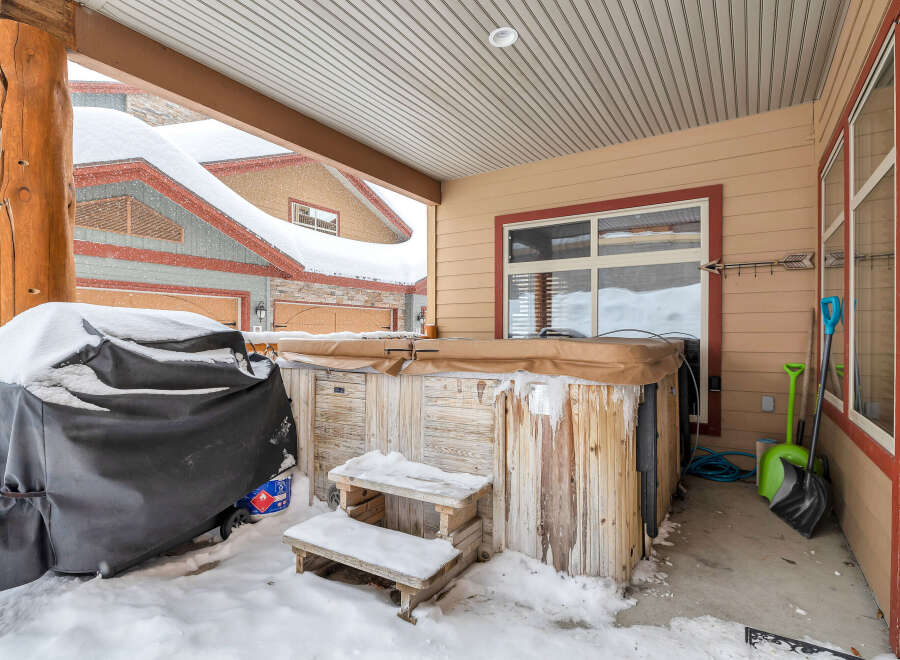 Enjoy the luxury of this property with a private hot tub, perfect for relaxing after a long day.